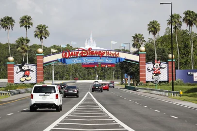 LAKE BUENA VISTA, FL - JULY 11: A view of the Walt Disney World theme park entrance on July 11, 2020 in Lake Buena Vista, Florida. The theme park reopened despite a surge in new COVID-19 infections throughout Florida, including the central part of the state where Orlando is located.   Octavio Jones/Getty Images/AFP<!-- NICAID(14543244) -->