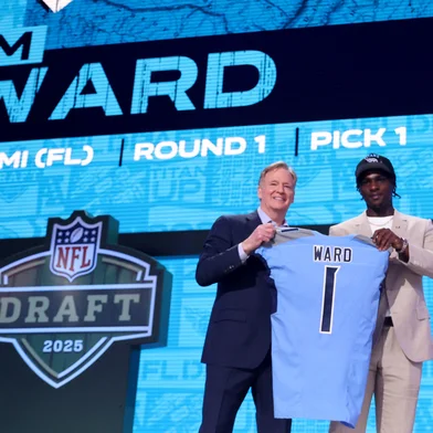 GREEN BAY, WISCONSIN - APRIL 24: Quarterback Cam Ward of Miami poses with NFL Commissioner Roger Goodell after being selected first overall pick by the Tennessee Titans during the first round of the 2025 NFL Draft at Lambeau Field on April 24, 2025 in Green Bay, Wisconsin.   Stacy Revere/Getty Images/AFP (Photo by Stacy Revere / GETTY IMAGES NORTH AMERICA / Getty Images via AFP)<!-- NICAID(16024258) -->