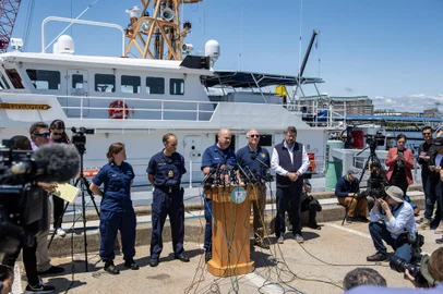 US Coast Guard (USCG) Captain Jamie Frederick speaks to reporters about the search efforts for the Titan submersible that went missing near the wreck of the Titanic, at Coast Guard Base in Boston, Massachusetts, on June 21, 2023. The USCG said Wednesday it had not identified the source of underwater noises detected by sonar in the search for the missing submersible. "We don't know what they are, to be frank with you," Frederick said regarding the sounds that had raised hopes the five people onboard are still alive. "We have to remain optimistic and hopeful when you're in a search and rescue case," he told reporters. (Photo by Joseph Prezioso / AFP)<!-- NICAID(15464305) -->