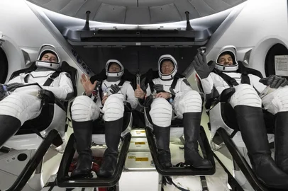 Roscosmos cosmonaut Andrey Fedyaev, left, NASA astronaut Warren âWoody" Hoburg, second from left, NASA astronaut Stephen Bowen, second from right, and UAE (United Arab Emirates) astronaut Sultan Alneyadi, right,  are seen inside the SpaceX Dragon Endeavour spacecraft onboard the SpaceX recovery ship MEGAN shortly after having landed in the Atlantic Ocean off the coast of Jacksonville, Florida, Monday, Sept. 4, 2023. Bowen, Hoburg, Alneyadi, and Fedyaev are returning after nearly six-months in space as part of Expedition 69 aboard the International Space Station. <!-- NICAID(15530776) -->