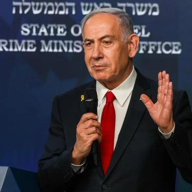 Israeli Prime Minister Benjamin Netanyahu gives a press conference in Jerusalem on May 21, 2025. Netanyahu said on May 21 that he was ready for a "temporary ceasefire" to guarantee the return of hostages held in Gaza, of whom 20 are "certainly" alive. (Photo by Ronen Zvulun / POOL / AFP)<!-- NICAID(16043095) -->