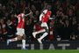 Arsenal's English midfielder #07 Bukayo Saka (R) celebrates scoring his team's third goal with Arsenal's Brazilian striker #09 Gabriel Jesus during the UEFA Champions League Group B football match between Arsenal and RC Lens at the Arsenal Stadium in north London on November 29, 2023. (Photo by Adrian DENNIS / AFP)<!-- NICAID(15612343) -->