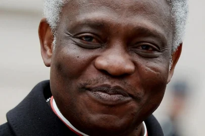 (FILES) Ghanaian cardinal Peter Kodwo Appiah Turkson arrives to take part in an afternoon meeting of pre-conclave on March 8, 2013 at the Vatican. Cardinals from all over the world will be in Rome for the funeral of Pope Francis, who died on April 21, 2025, and to take part in the General Congregations (preparatory meetings) before the conclave. Among them, 135 cardinal electors, those under the age of 80, will take part in the vote. Diplomats, practitioners, theologians and mediators: Appiah Turkson is one of 15 whose votes will count when the time comes to cast their ballots. Although some of them are regularly presented by observers as "papabili", i.e. favourites to succeed Francis, the outcome of the conclave is always unpredictable, making any prognosis very hazardous. (Photo by Filippo MONTEFORTE / AFP)<!-- NICAID(16021516) -->
