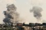 Smoke billows from the Gaza's Rafah border crossing with Egypt during an Israeli airstrike on October 10, 2023. Gaza's border crossing with Egypt, its only one that bypasses Israel, was hit by an Israeli air strike on October 10, 2023 for the second time in 24 hours, witnesses and a rights group said. Witnesses said the strike hit the no-man's land between the Egyptian and Palestinian gates, damaging the hall on the Palestinian side. (Photo by SAID KHATIB / AFP)<!-- NICAID(15565303) -->