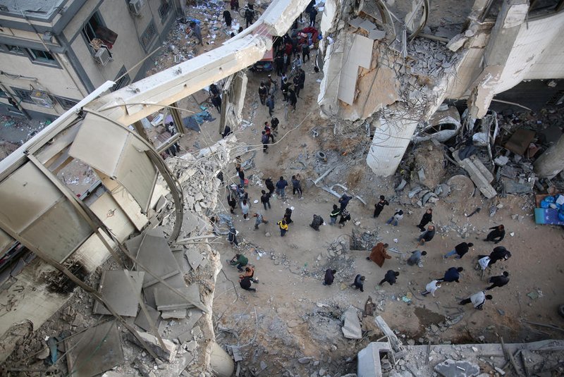 Palestinians inspect the damage at Gaza's Al-Shifa hospital after the Israeli military withdrew from the complex housing the hospital on April 1, 2024, amid the ongoing battles Israel and the Hamas militant group. (Photo by AFP)<!-- NICAID(15721794) -->
