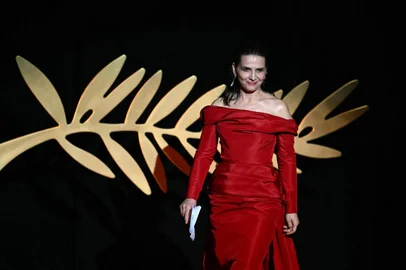 (FILES) French actress Juliette Binoche arrives on stage before awarding US actress Meryl Streep the Honorary Palme d'Or during the Opening Ceremony at the 77th edition of the Cannes Film Festival in Cannes, southern , on May 14, 2024. The Cannes Film Festival announced February 4, 2025 that it had chosen Juliette Binoche, one of 's best-known actors, to preside over its 78th edition which will take place in May. The 60-year-old star of films from "The English Patient" to "Certified Copy" will succeed "Barbie" director Greta Gerwig who served as jury president last year. (Photo by CHRISTOPHE SIMON / AFP)<!-- NICAID(15968566) -->
