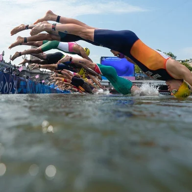 Netherlands' Mitch Kolkman competes in the swimming stage in the Seine during the men's individual triathlon at the Paris 2024 Olympic Games in central Paris on July 31, 2024.David Goldman / POOL / AFP