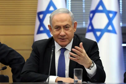 Israeli Prime Minister Benjamin Netanyahu speaks during a meeting of the right-wing bloc at the Knesset (Israeli parliament) in Jerusalem on November 20, 2019. (Photo by GALI TIBBON / AFP)Editoria: POLLocal: JerusalemIndexador: GALI TIBBONSecao: politics (general)Fonte: AFPFotógrafo: STR<!-- NICAID(14334860) -->