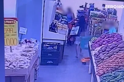 Câmera de segurança flagra atuação de estrangeira no furto de cartões e celulares em SC