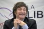 Lawmaker and presidential candidate for La Libertad Avanza party, Javier Milei, smiles during a press conference in Buenos Aires on October 11, 2023, ahead of Argentina's presidential elections. Argentina's election campaign was marked by heated exchanges Wednesday as the incumbent president pressed charges against frontrunner candidate Javier Milei for dissing the national currency, which subsequently crashed. President Alberto Fernandez announced he had reported Milei for "public intimidation" after the candidate said Monday the Argentine peso "isn't worth excrement." (Photo by JUAN MABROMATA / AFP)Editoria: FINLocal: Buenos AiresIndexador: JUAN MABROMATASecao: political candidatesFonte: AFPFotógrafo: STF<!-- NICAID(15572404) -->