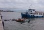 Embarcação afunda após colisão com barco de passageiros em Rio Grande