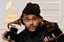 604246649The Weeknd holds his trophies for  Best R&B Performance and Best Urban Contemporary Album in the press room during the 58th Annual Grammy Music Awards in Los Angeles on February 15, 2016. / AFP / MARK RALSTONEditoria: ACELocal: Los AngelesIndexador: MARK RALSTONSecao: musicFonte: AFPFotógrafo: STF