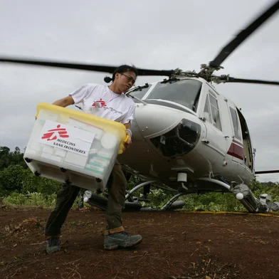 FOTO DE 2005MSF staff visiting remote villages along the coastline of Aceh in the northern Sumatra province of Indonesia.MSF has two helicopers that ferry staff and supplies to the areas MSF teams are working. Staff are kept to a minimum and the rest of the plane is filled with rice, water and essential supplies. On the return trip, patients are brought back to Banda Aceh for more treatment.<!-- NICAID(16007052) -->