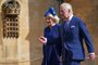 Britain's King Charles III (R) and Britain's Camilla, Queen Consort arrive for the Easter Mattins Service at St. George's Chapel, Windsor Castle on April 9, 2023. (Photo by Yui Mok / POOL / AFP)<!-- NICAID(15406019) -->