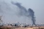 A picture taken from southern Israel near the border with the Gaza Strip on December 2, 2023, shows smoke billowing over the Palestinian territory during Israeli bombardment amid continuing battles between Israel and the militant group Hamas. Israel carried out deadly bombardments in Gaza for a second day on December 2 after a week-long truce with Hamas collapsed despite international calls for an extension. (Photo by Jack Guez / AFP)<!-- NICAID(15615023) -->