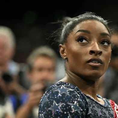 US' Simone Biles is seen during the artistic gymnastics women's team final during the Paris 2024 Olympic Games at the Bercy Arena in Paris, on July 30, 2024. (Photo by Lionel BONAVENTURE / AFP)<!-- NICAID(15828607) -->