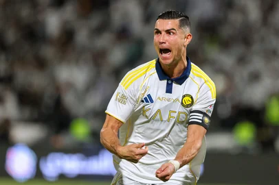 Nassr's Portuguese forward #07 Cristiano Ronaldo celebrates scoring his team's third goal during the Saudi Pro League football match between Al-Shabab and Al-Nassr at King Fahd Sports City Stadium in Riyadh on May 7, 2026. (Photo by Fayez NURELDINE / AFP)<!-- NICAID(16280874) -->