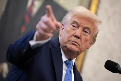WASHINGTON, DC - APRIL 22: U.S. President Donald Trump delivers remarks during the swearing-in ceremony for Securities and Exchange Commission Chairman Paul Atkins in the Oval Office at the White House on April 22, 2025 in Washington, DC. Having previously served as a commissioner at the SEC under President George W. Bush, Atkins is free-market, pro-business conservative and is expected to take a lighter regulatory touch on crypto and other digital assets.   Chip Somodevilla/Getty Images/AFP (Photo by CHIP SOMODEVILLA / GETTY IMAGES NORTH AMERICA / Getty Images via AFP)<!-- NICAID(16022120) -->