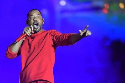US actor and singer Will Smith performs at the main stage of the Rock in Rio music festival in the Rio 2016 Olympic Park in Rio de Janeiro, Brazil, on September 19, 2024. (Photo by Daniel RAMALHO / AFP)Editoria: ACELocal: Rio de JaneiroIndexador: DANIEL RAMALHOSecao: musicFonte: AFPFotógrafo: STR<!-- NICAID(15998224) -->