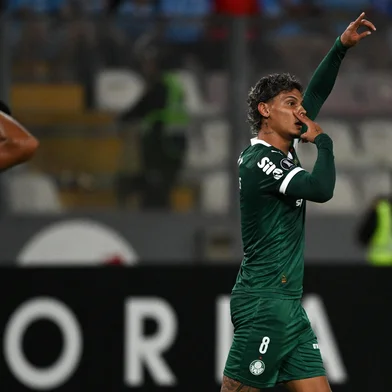 Palmeiras' Colombian midfielder #08 Richard Rios celebrates after scoring during the Copa Libertadores group stage first round football match between Peru's Sporting Cristal and Brazil's Palmeiras at the Nacional stadium in Lima, on April 3, 2025. (Photo by ERNESTO BENAVIDES / AFP)<!-- NICAID(16010006) -->