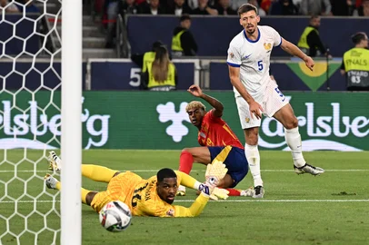 Spain's forward #19 Lamine Yamal scores the team's fifth goal 5:1 during the UEFA Nations League semi-final football match between Spain and  in Stuttgart, southwestern , on June 5, 2025. (Photo by THOMAS KIENZLE / AFP)<!-- NICAID(16053348) -->