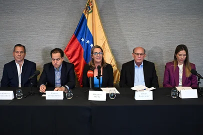 (L-R) Humberto Villalobos, Pedro Urruchurtu, Magallí Meda, Omar González, and Claudia Macero, five Venezuelan opposition figures, hold a press conference after spending a year of forced confinement in Argentina's embassy in Caracas, on May 24, 2025, in Washington, DC. Five Venezuelan opposition figures who have been holed up in Argentina's embassy in Caracas for more than a year are now in the United States after a "rescue" operation, Secretary of State Marco Rubio said on May 20. (Photo by Alex WROBLEWSKI / AFP) / The erroneous mention appearing in the metadata of this photo by Alex WROBLEWSKI has been modified in AFP systems in the following manner: [May 24, 2025] instead of [May 24, 2024]. Please immediately remove the erroneous mention[s] from all your online services and delete it from your servers. If you have been authorized by AFP to distribute it to third parties, please ensure that the same actions are carried out by them. Failure to promptly comply with these instructions will entail liability on your part for any continued or post notification usage. Therefore we thank you very much for all your attention and prompt action. We are sorry for the inconvenience this notification may cause and remain at your disposal for any further information you may require.<!-- NICAID(16045301) -->