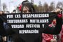 A woman participates in a march commemorating the murder of 119 leftist militants victims of the so-called "Operation Colombo" at the hands of security organizations of Augusto Pinochet's dictatorship (1973-1990) in Santiago, on July 22, 2023. (Photo by MARTIN BERNETTI / AFP)<!-- NICAID(15489951) -->