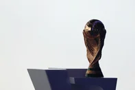 The FIFA World Cup trophy is seen on stage during the draw for the 2026 FIFA Football World Cup taking place in the US, Canada and Mexico, at the Kennedy Center, in Washington, DC, on December 5, 2025. (Photo by Dan Mullan / POOL / AFP)<!-- NICAID(16181202) -->