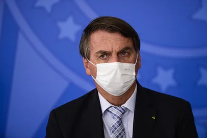 O presidente Jair Bolsonaro durante cerimônia para sanção dos projetos de lei que ampliam a aquisição de vacinas pelo Governo Federal.<!-- NICAID(14732252) -->