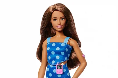 An undated handout photograph released on July 8, 2025, by US toy manufacturer Mattel, shows their new Barbie doll with type 1 diabetes. Mattel has launched its first Barbie doll with type 1 diabetes in a bid to foster a greater sense of inclusion and empathy among children, a company vice-president said on July 8, 2025. The new Barbie has been designed in partnership with the global type 1 diabetes not-for-profit Breakthrough T1D. (Photo by Handout / MATTEL / AFP) / XGTY / RESTRICTED TO EDITORIAL USE - MANDATORY CREDIT "AFP PHOTO / HANDOUT / MATTEL " - NO MARKETING NO ADVERTISING CAMPAIGNS - DISTRIBUTED AS A SERVICE TO CLIENTS<!-- NICAID(16076315) -->