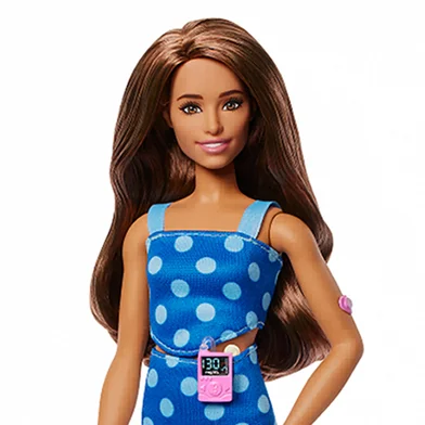 An undated handout photograph released on July 8, 2025, by US toy manufacturer Mattel, shows their new Barbie doll with type 1 diabetes. Mattel has launched its first Barbie doll with type 1 diabetes in a bid to foster a greater sense of inclusion and empathy among children, a company vice-president said on July 8, 2025. The new Barbie has been designed in partnership with the global type 1 diabetes not-for-profit Breakthrough T1D. (Photo by Handout / MATTEL / AFP) / XGTY / RESTRICTED TO EDITORIAL USE - MANDATORY CREDIT "AFP PHOTO / HANDOUT / MATTEL " - NO MARKETING NO ADVERTISING CAMPAIGNS - DISTRIBUTED AS A SERVICE TO CLIENTS<!-- NICAID(16076315) -->