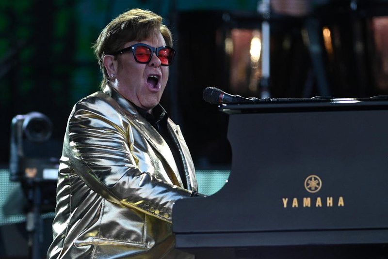 775967125British legendary singer Elton John performs on the Pyramid Stage on day 5 of the Glastonbury festival in the village of Pilton in Somerset, southwest England, on June 25, 2023. Elton John closes out Britain's legendary Glastonbury Festival on Sunday in what has been billed as his final UK performance. The 76-year-old pop superstar is winding down a glittering live career with a global farewell tour, having played his last concerts in the United States in May ahead of a final gig in Stockholm on July 8. (Photo by Oli SCARFF / AFP)Editoria: ACELocal: PiltonIndexador: OLI SCARFFSecao: musicFonte: AFPFotógrafo: STF<!-- NICAID(15466118) -->
