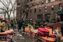 Bronx Apartment Building Fire Leaves Dozens InjuredNEW YORK, NY - JANUARY 09: Emergency first responders remain at the scene of an intense fire at a 19-story residential building that erupted in the morning on January 9, 2022 in the Bronx borough of New York City. Reports indicate over 50 people were injured.   Scott Heins/Getty Images/AFP (Photo by Scott Heins / GETTY IMAGES NORTH AMERICA / Getty Images via AFP)Editoria: DISLocal: New YorkIndexador: SCOTT HEINSSecao: fireFonte: GETTY IMAGES NORTH AMERICA<!-- NICAID(14985878) -->