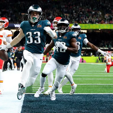 NEW ORLEANS, LOUISIANA - FEBRUARY 09: Cooper DeJean #33 of the Philadelphia Eagles celebrates scoring a touchdown after making an interception in the second quarter against the Kansas City Chiefs during Super Bowl LIX at Caesars Superdome on February 09, 2025 in New Orleans, Louisiana.   Gregory Shamus/Getty Images/AFP (Photo by Gregory Shamus / GETTY IMAGES NORTH AMERICA / Getty Images via AFP)<!-- NICAID(15972670) -->