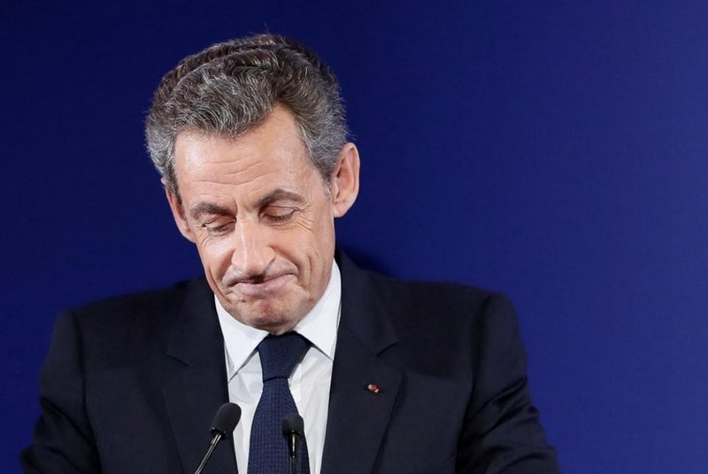 (FILES) This file photo taken on taken on November 20, 2016 in Paris shows former French president Nicolas Sarkozy - Nicolas Sarkozy was convicted on September 30, 2021 of illegal campaign financing in the second trial of the so-called Bygmalion case. (Photo by IAN LANGSDON / POOL / AFP)<!-- NICAID(14902572) -->