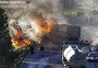 Duas pessoas morrem em acidente entre caminhões que provocou incêndio na BR-386