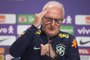 Dorival Junior puts on a training jacket during his presentation as the new coach of the Brazilian national football team, at the headquarters of the Brazilian Football Confederation (CBF) in Rio de Janeiro, Brazil, on January 11, 2024. Sao Paulo FC boss Dorival Junior replaces Fernando Diniz was fired from the five-time world champions following a string of losses. "It's a personal dream come true," the 2023 Copa do Brasil-winning coach said in a statement posted by Sao Paulo on X, formerly Twitter, on January 7, after days of speculation he would be named to take over struggling Brazil. (Photo by Daniel RAMALHO / AFP)Editoria: SPOLocal: Rio de JaneiroIndexador: DANIEL RAMALHOSecao: soccerFonte: AFPFotógrafo: STR<!-- NICAID(15647941) -->