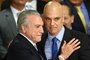 Brazilian acting President Michel Temer (L) and his new Minister of justice Alexandre de Moraes gesture during the inauguration ceremony of the new ministers at Planalto Palace, in Brasilia, on May 12, 2016.Brazilian President Dilma Rousseff was suspended Thursday to face an impeachment trial, ceding power to her vice president-turned-enemy Michel Temer, who quickly pivoted toward a more business-friendly government, naming a cabinet chosen to calm the markets after a paralyzing impeachment battle and steer the country out of its worst recession in decades. / AFP PHOTO / Brazilian Vice Presidency / MARCOS CORREA / RESTRICTED TO EDITORIAL USE - MANDATORY CREDIT "AFP PHOTO / BRAZILIAN VICE PRESIDENCY " - NO MARKETING - NO ADVERTISING CAMPAIGNS - DISTRIBUTED AS A SERVICE TO CLIENTSEditoria: POLLocal: BrasíliaIndexador: MARCOS CORREASecao: politics (general)Fonte: Brazilian Vice PresidencyFotógrafo: STR