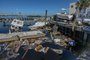Debris is seen in Fort Myers, Florida, in the aftermath of Hurricane Ian on October 1, 2022. - Shocked Florida communities counted their dead Saturday as the full scale of the devastation came into focus, two days after Hurricane Ian tore into the coastline as one of the most powerful storms ever to hit the United States. (Photo by Giorgio VIERA / AFP)<!-- NICAID(15223212) -->