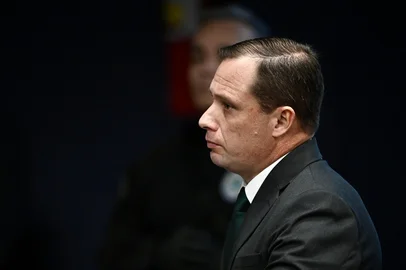 Brazil's Army Lieutenant Colonel Mauro Cid, aide-de-camp to former President Jair Bolsonaro, looks on during a session of the Brazilian Supreme Court judging the participation of those accused of the attempted coup d'état in January 2023, in Brasilia on June 9, 2025. The defendants in the coup trial of Brazil's far-right former president Jair Bolsonaro began testifying at the Supreme Court on Monday. Bolsonaro, who governed Brazil from 2019 to 2022, will take the stand along with seven co-accused on charges of plotting to overturn the results of the 2022 elections that Bolsonaro lost to leftist President Luiz Inacio Lula da Silva.  (Photo by EVARISTO SA / AFP)Editoria: POLLocal: BrasíliaIndexador: EVARISTO SASecao: coup d'etatFonte: AFPFotógrafo: STF<!-- NICAID(16056444) -->