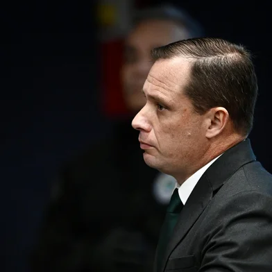 Brazil's Army Lieutenant Colonel Mauro Cid, aide-de-camp to former President Jair Bolsonaro, looks on during a session of the Brazilian Supreme Court judging the participation of those accused of the attempted coup d'état in January 2023, in Brasilia on June 9, 2025. The defendants in the coup trial of Brazil's far-right former president Jair Bolsonaro began testifying at the Supreme Court on Monday. Bolsonaro, who governed Brazil from 2019 to 2022, will take the stand along with seven co-accused on charges of plotting to overturn the results of the 2022 elections that Bolsonaro lost to leftist President Luiz Inacio Lula da Silva.  (Photo by EVARISTO SA / AFP)Editoria: POLLocal: BrasíliaIndexador: EVARISTO SASecao: coup d'etatFonte: AFPFotógrafo: STF<!-- NICAID(16056444) -->