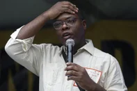 (FILES) Brazilian Minister of Human Rights, Silvio de Almeida, speaks during a silent march in memory of the victims of the State's violence during the Brazilian 1964 dictatorship in Sao Paulo, Brazil on April 2, 2023. Brazil's Minister of Human Rights and Citizenship, Silvio Almeida, was accused Thursday of sexual harassment by several women through the Me Too organization. (Photo by Miguel SCHINCARIOL / AFP)Editoria: WARLocal: Sao PauloIndexador: MIGUEL SCHINCARIOLSecao: governmentFonte: AFPFotógrafo: STR<!-- NICAID(15859774) -->