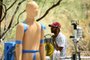 Ankit Joshi monitors a heat and wind experiment with ANDI, an Advanced Newton Dynamic Instrument, to learn more about the effect of heat exposure on the human body at Arizona State University (ASU) during a record heat wave in Phoenix, Arizona, on July 20, 2023. ANDI is the first outdoor sweating, breathing, and moving thermal manikin and Arizona researchers have deployed it in the southwestern state's capital Phoenix which is currently enduring its longest heat wave in history: on Friday, the mercury exceeded 110 degrees Fahrenheit (43 degrees Celsius) for the 22nd day in a row. (Photo by Patrick T. Fallon / AFP)Editoria: SCILocal: PhoenixIndexador: PATRICK T. FALLONSecao: global warmingFonte: AFPFotógrafo: STF<!-- NICAID(15490775) -->