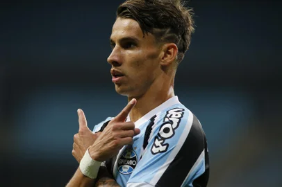 Brazil's Gremio Ferreira celebrates after scoring against Argentina's Lanus during the Copa Sudamericana football tournament group stage match at Gremio Arena in Porto Alegre, Brazil, on May 13, 2021. (Photo by SILVIO AVILA / POOL / AFP)Editoria: SPOLocal: Porto AlegreIndexador: SILVIO AVILASecao: soccerFonte: POOLFotógrafo: STR<!-- NICAID(14782882) -->