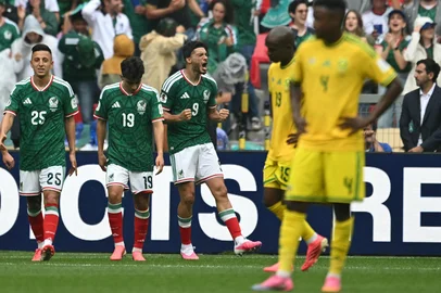 Mexico's forward #09 Raul Jimenez celebrates scoring his team's second goal next to teammates midfielder #25 Roberto Alvarado and midfielder #19 Gilberto Mora during the 2026 World Cup Group A football match between Mexico and South Africa at the Mexico City Stadium in Mexico City on June 11, 2026. (Photo by Yuri CORTEZ / AFP)<!-- NICAID(16304679) -->