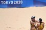 Brazil's Agatha Bednarczuk (L) hugs Brazil's Eduarda Santos Lisboa in their women's preliminary beach volleyball pool C match between Brazil and Argentina during the Tokyo 2020 Olympic Games at Shiokaze Park in Tokyo on July 24, 2021. (Photo by Angela WEISS / AFP)Editoria: SPOLocal: TokyoIndexador: ANGELA WEISSSecao: volleyballFonte: AFPFotógrafo: STF<!-- NICAID(14843864) -->