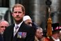 Britain's Prince Harry, Duke of Sussex looks on as Britain's King Charles III leaves Westminster Abbey after the Coronation Ceremonies in central London on May 6, 2023. - The set-piece coronation is the first in Britain in 70 years, and only the second in history to be televised. Charles will be the 40th reigning monarch to be crowned at the central London church since King William I in 1066. Outside the UK, he is also king of 14 other Commonwealth countries, including Australia, Canada and New Zealand. (Photo by Ben Stansall / POOL / AFP)<!-- NICAID(15421614) -->