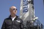 (FILES) This file handout photo taken on April 24, 2015 obtained courtesy of Blue Origin shows Jeff Bezos, founder of Blue Origin, at New Shepard's West Texas launch facility before the rocket's maiden voyage. - Jeff Bezos sets his sights on a new frontier in space in the coming days after building a gargantuan business empire which has in many ways conquered the Earth. (Photo by - / BLUE ORIGIN / AFP) / == RESTRICTED TO EDITORIAL USE  / MANDATORY CREDIT:  "AFP PHOTO /  BLUE ORIGIN" / NO MARKETING / NO ADVERTISING CAMPAIGNS /  DISTRIBUTED AS A SERVICE TO CLIENTS  ==<!-- NICAID(14838804) -->