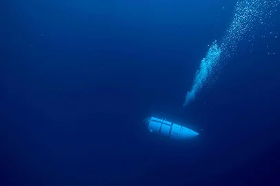This undated image courtesy of OceanGate Expeditions, shows their Titan submersible during a descent. Rescue teams expanded their search underwater on June 20, 2023, as they raced against time to find a Titan deep-diving tourist submersible that went missing near the wreck of the Titanic with five people on board and limited oxygen. All communication was lost with the 21-foot (6.5-meter) Titan craft during a descent June 18 to the Titanic, which sits at a depth of crushing pressure more than two miles (nearly four kilometers) below the surface of the North Atlantic. (Photo by Handout / OceanGate Expeditions / AFP) / RESTRICTED TO EDITORIAL USE - MANDATORY CREDIT "AFP PHOTO / OceanGate Expeditions" - NO MARKETING NO ADVERTISING CAMPAIGNS - DISTRIBUTED AS A SERVICE TO CLIENTS<!-- NICAID(15462063) -->