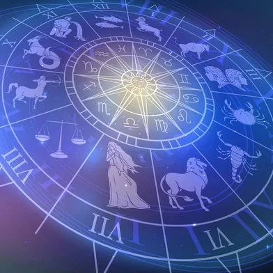 Wheel chart with zodiac signs in space, astrology and horoscope<!-- NICAID(15316343) -->